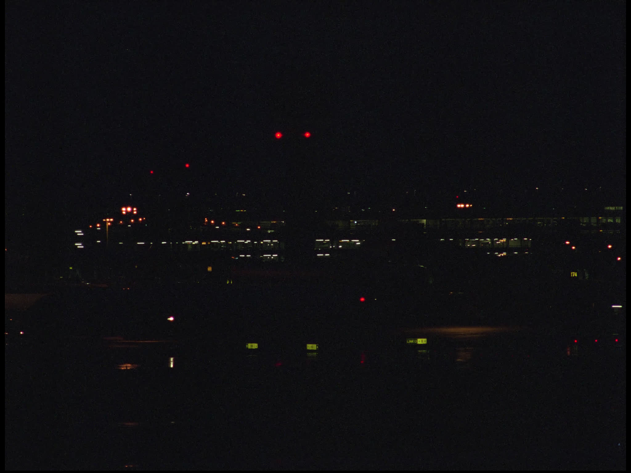 Plane Taxiing at Heathrow at Night