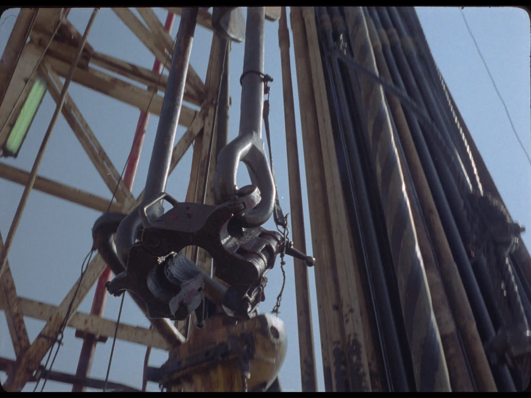 Grapple Raised to Top of Derrick