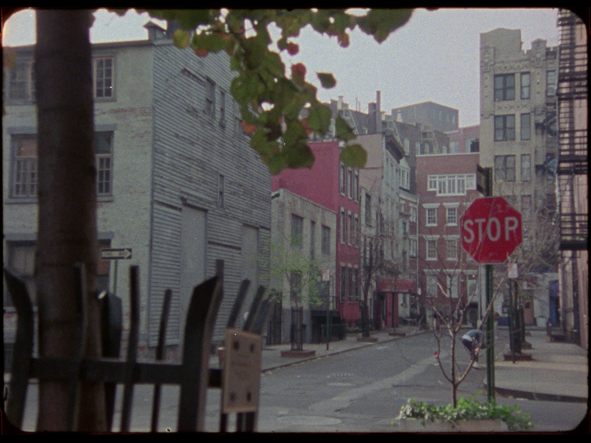 Men Playing Ball in New York Street
