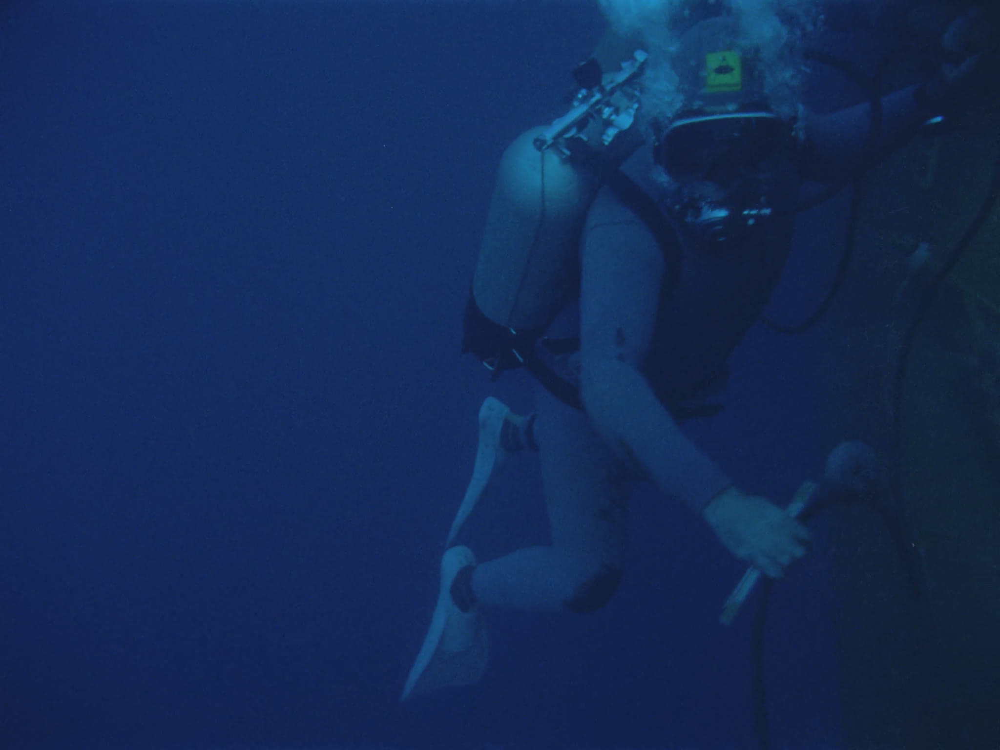 Divers Inspecting Oil Pipes