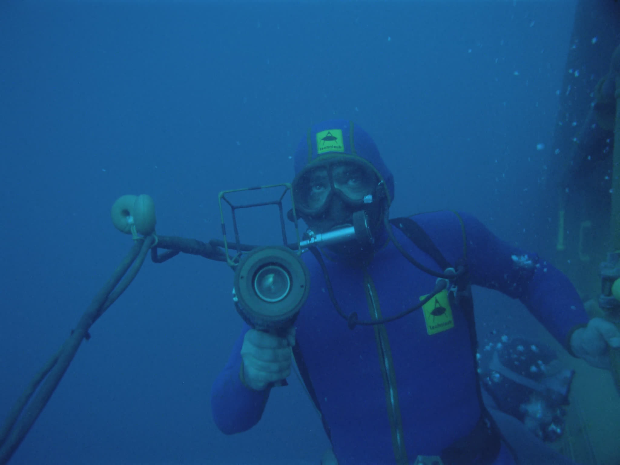 Divers Inspecting Oil Pipes