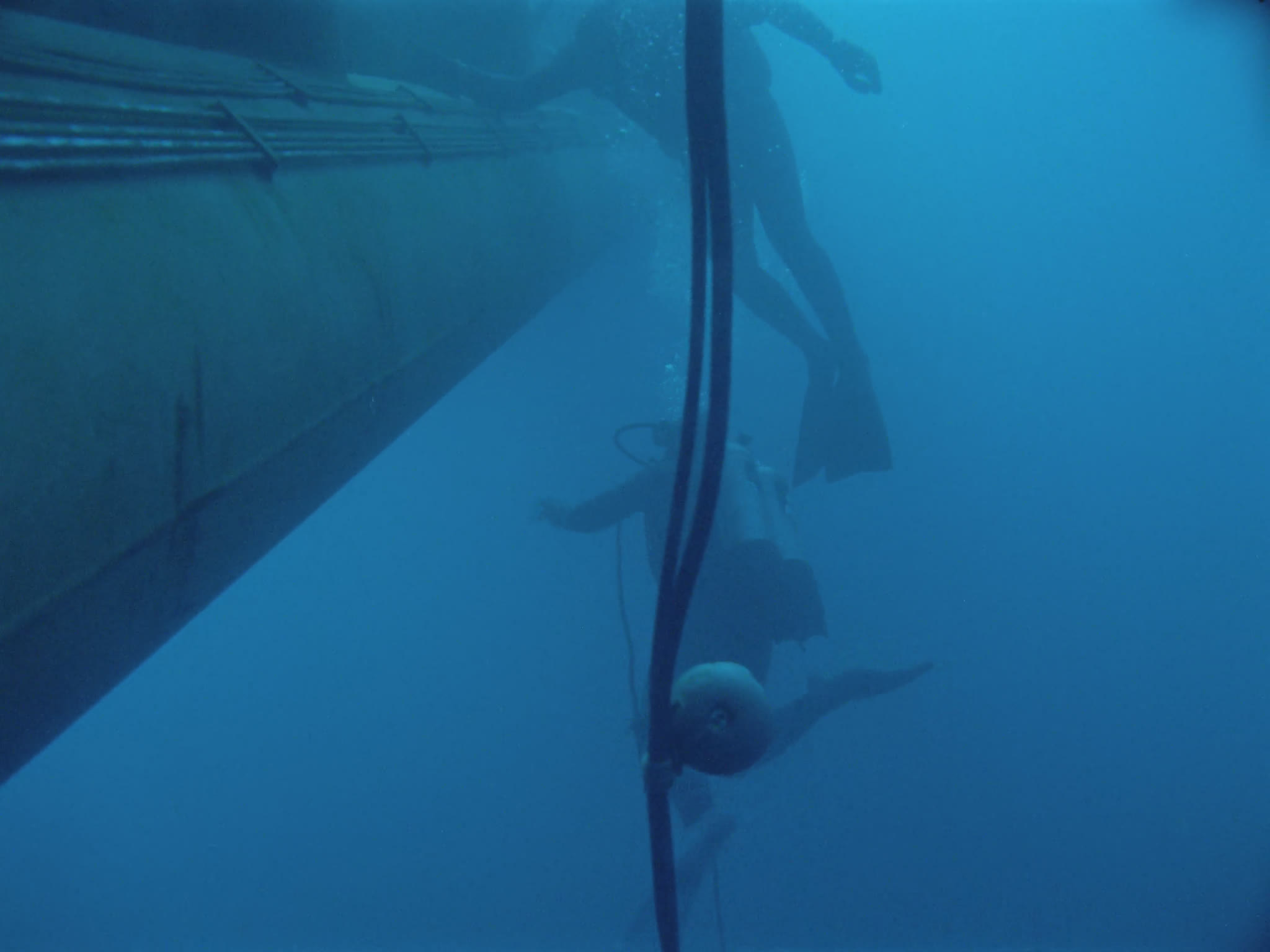 Divers Inspecting Cable