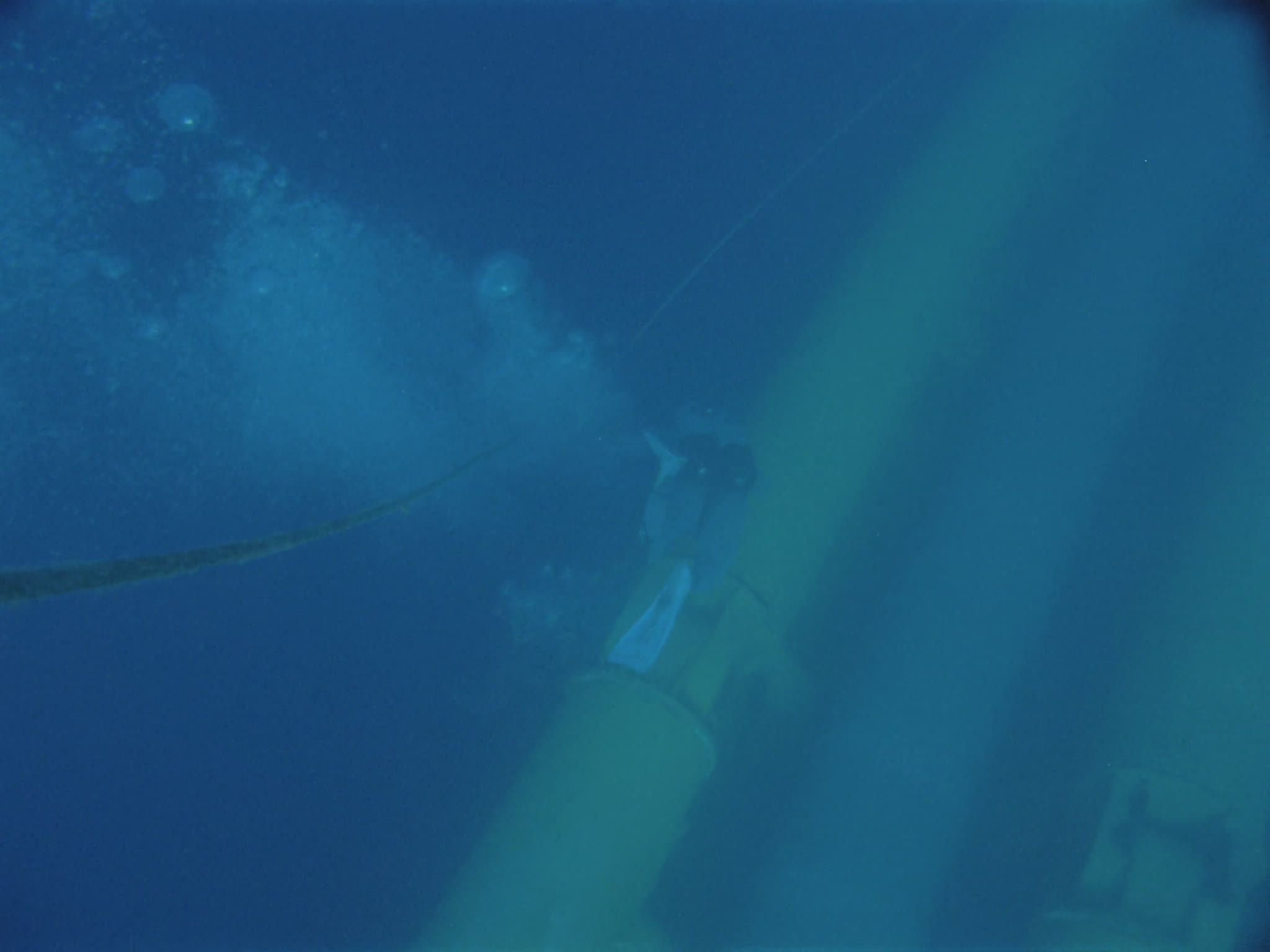 Divers Inspecting Oil Pipes
