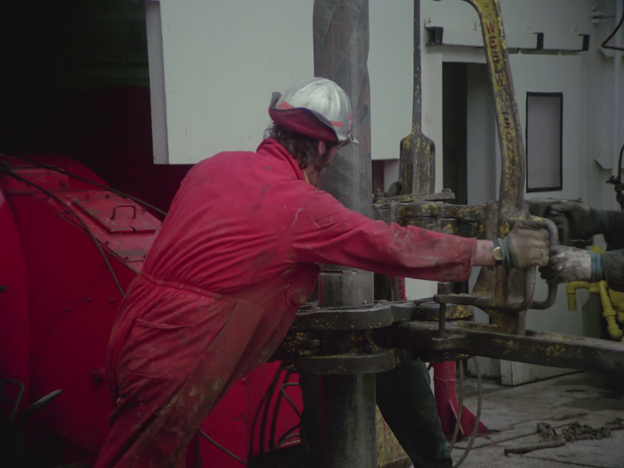 Workers Working on the Drill Deck of an Oil Rig