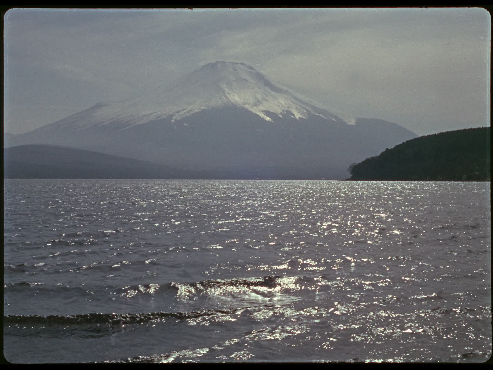 Mount Fuji with lapping waves