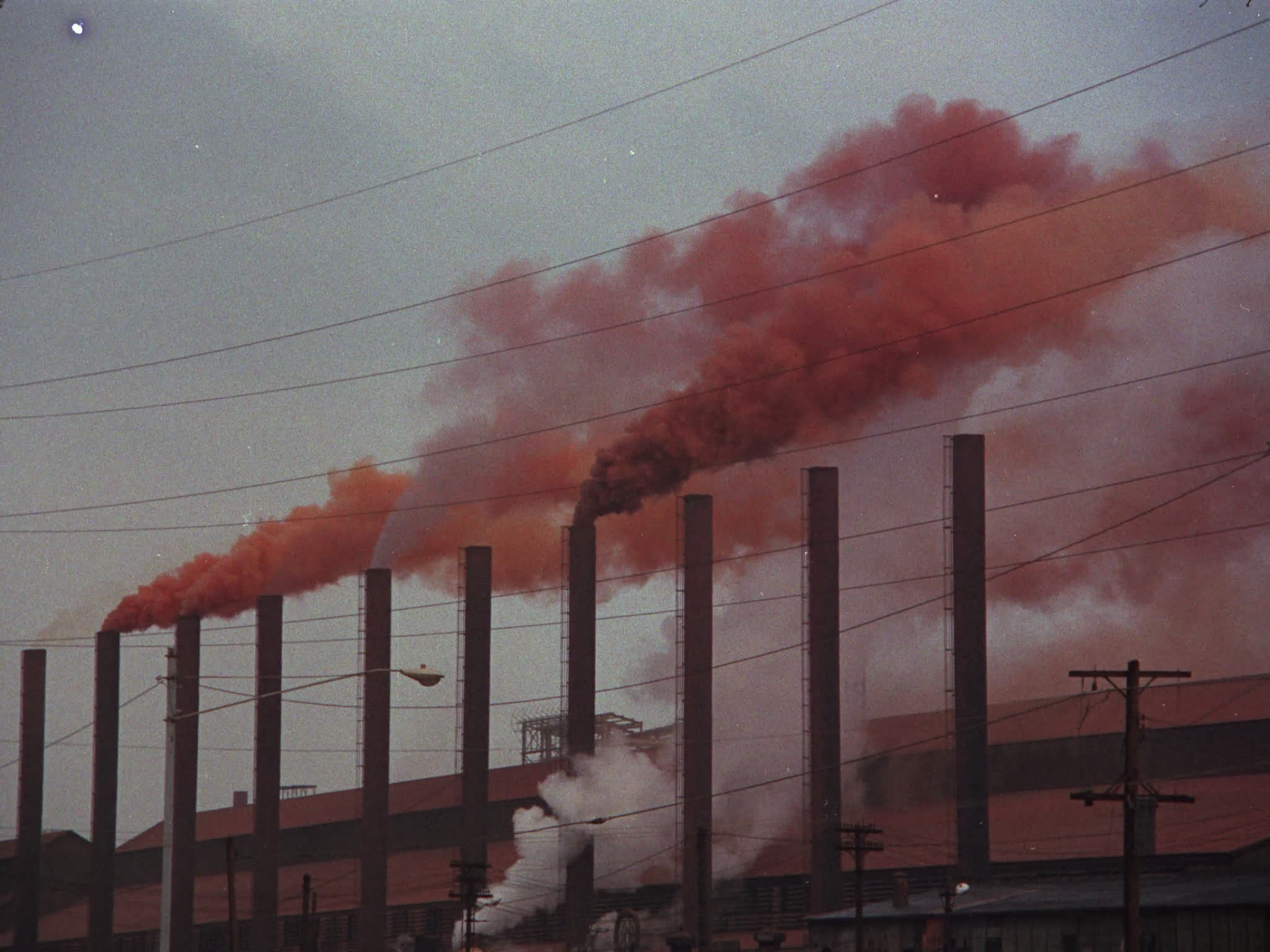 Orange Smoke From Industrial Complex