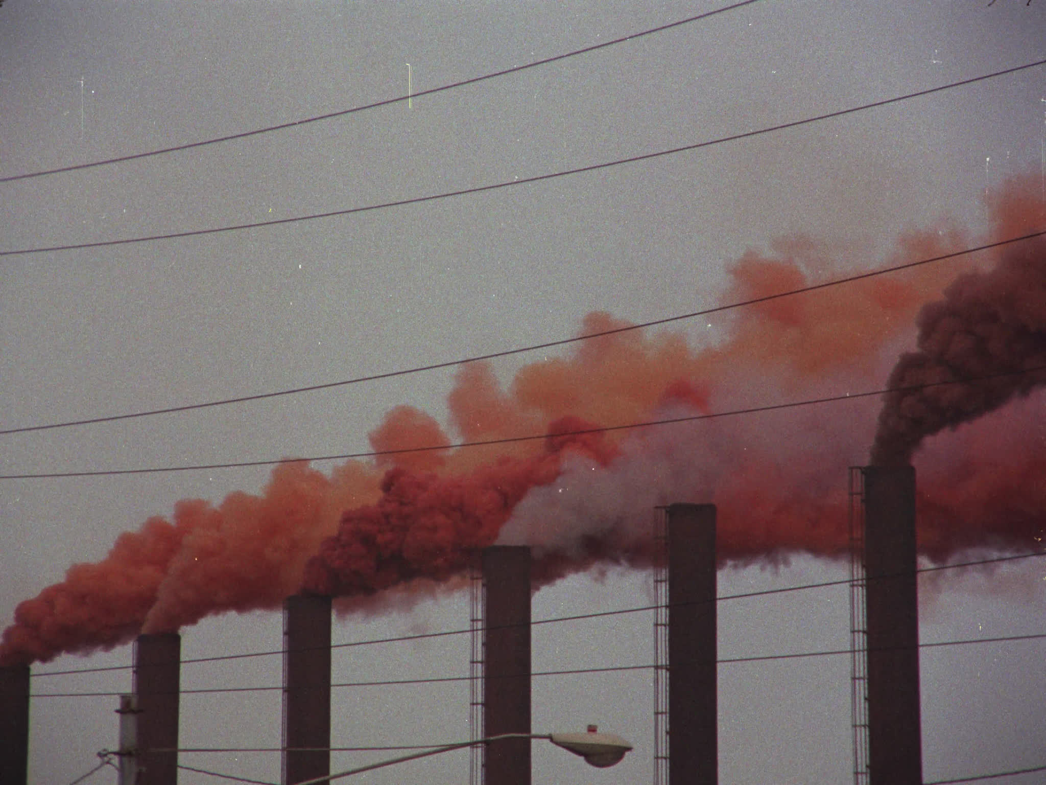 Orange Smoke From Industrial Complex