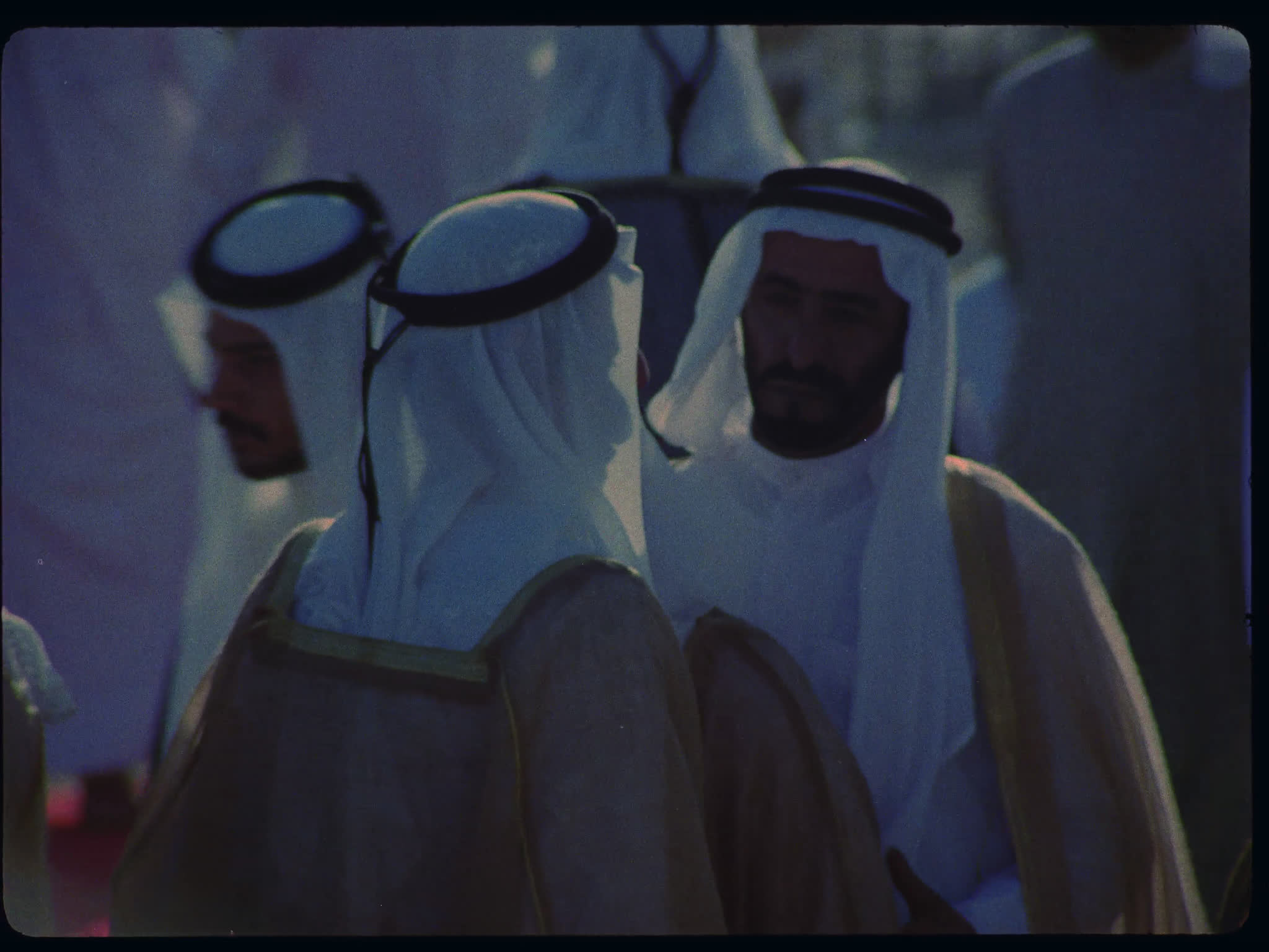 Men Greeting Each Other in a Mosque