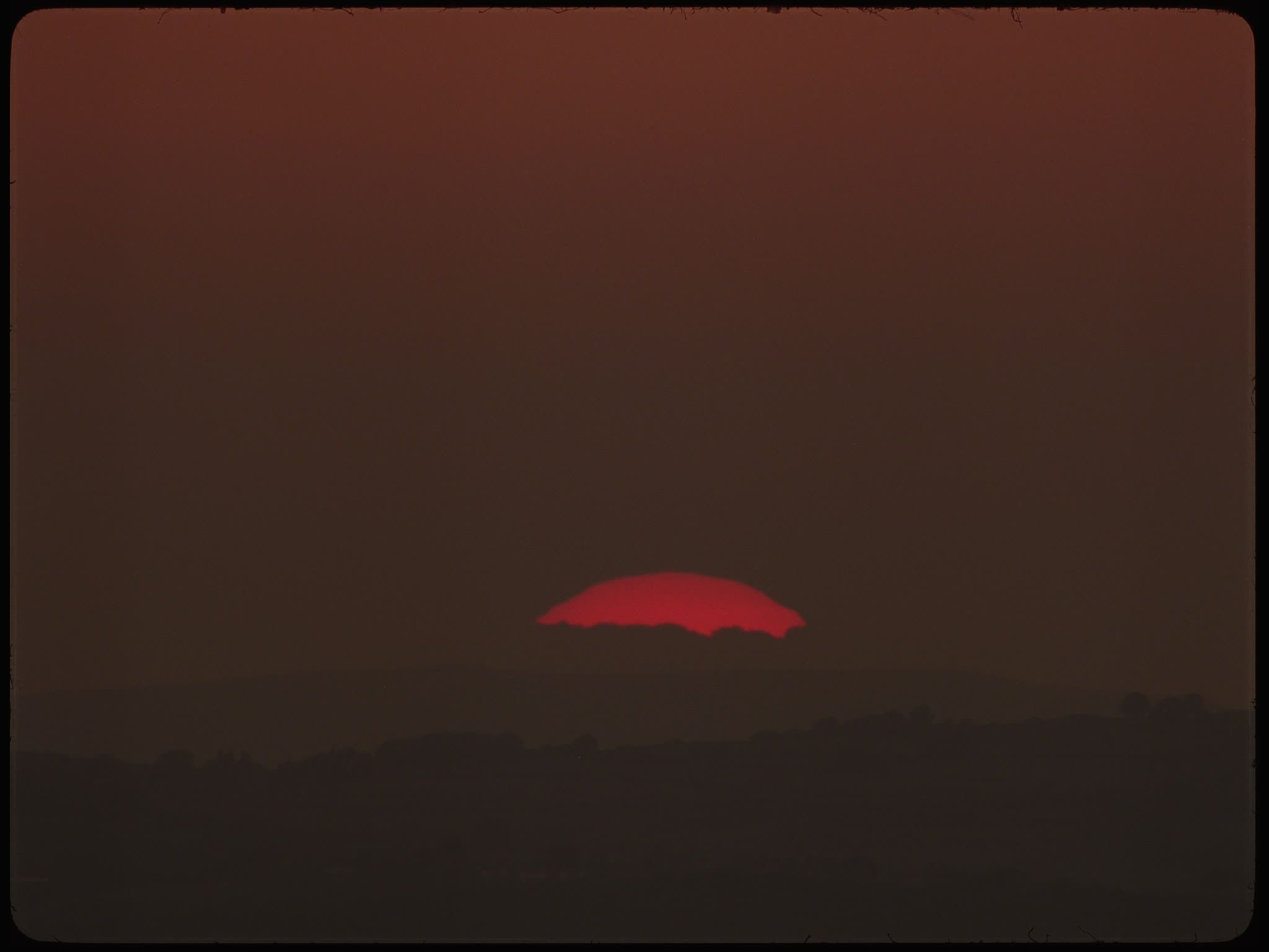 Time Lapse Sunset Behind Hill