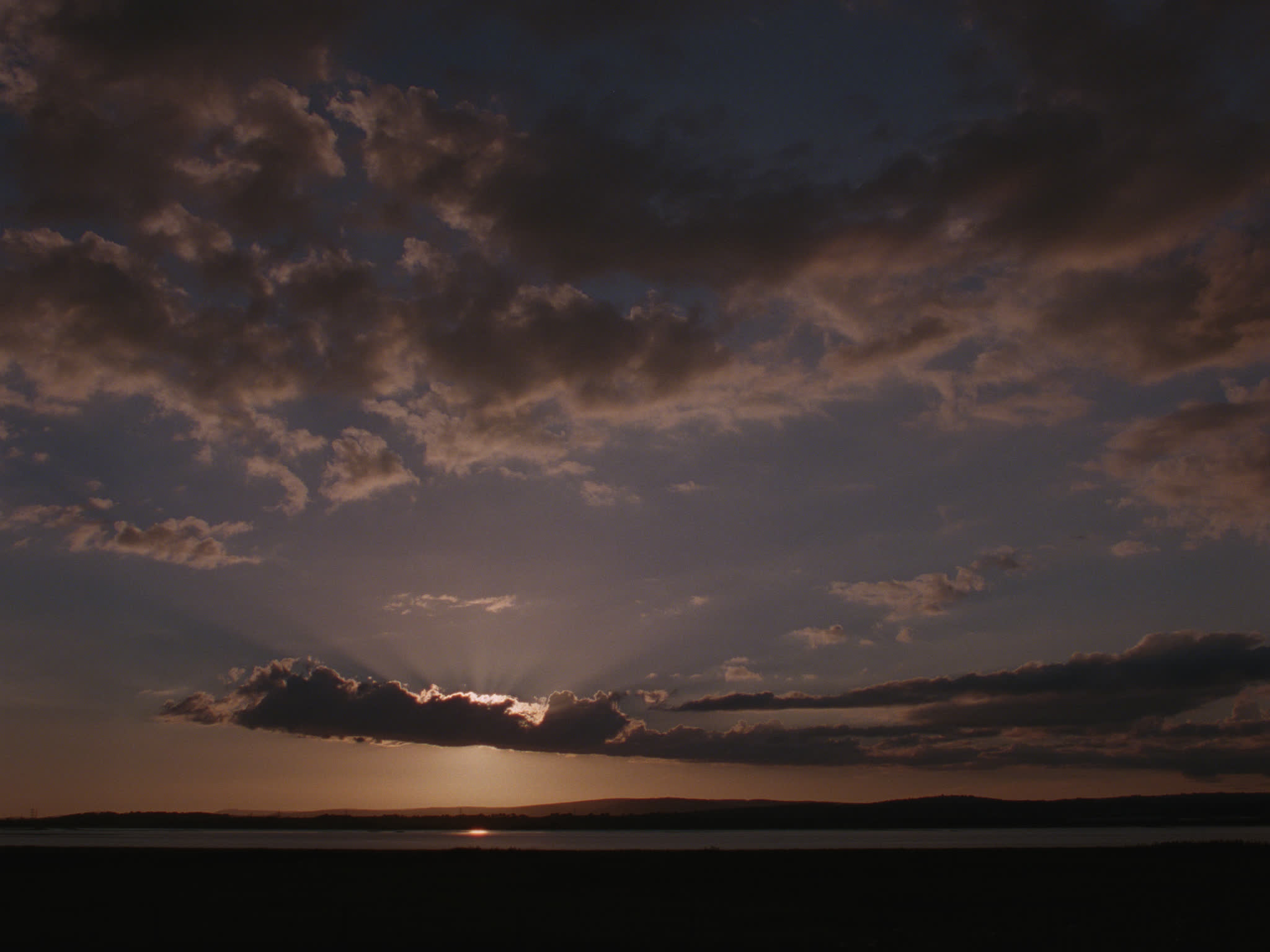 Sun Behind Clouds