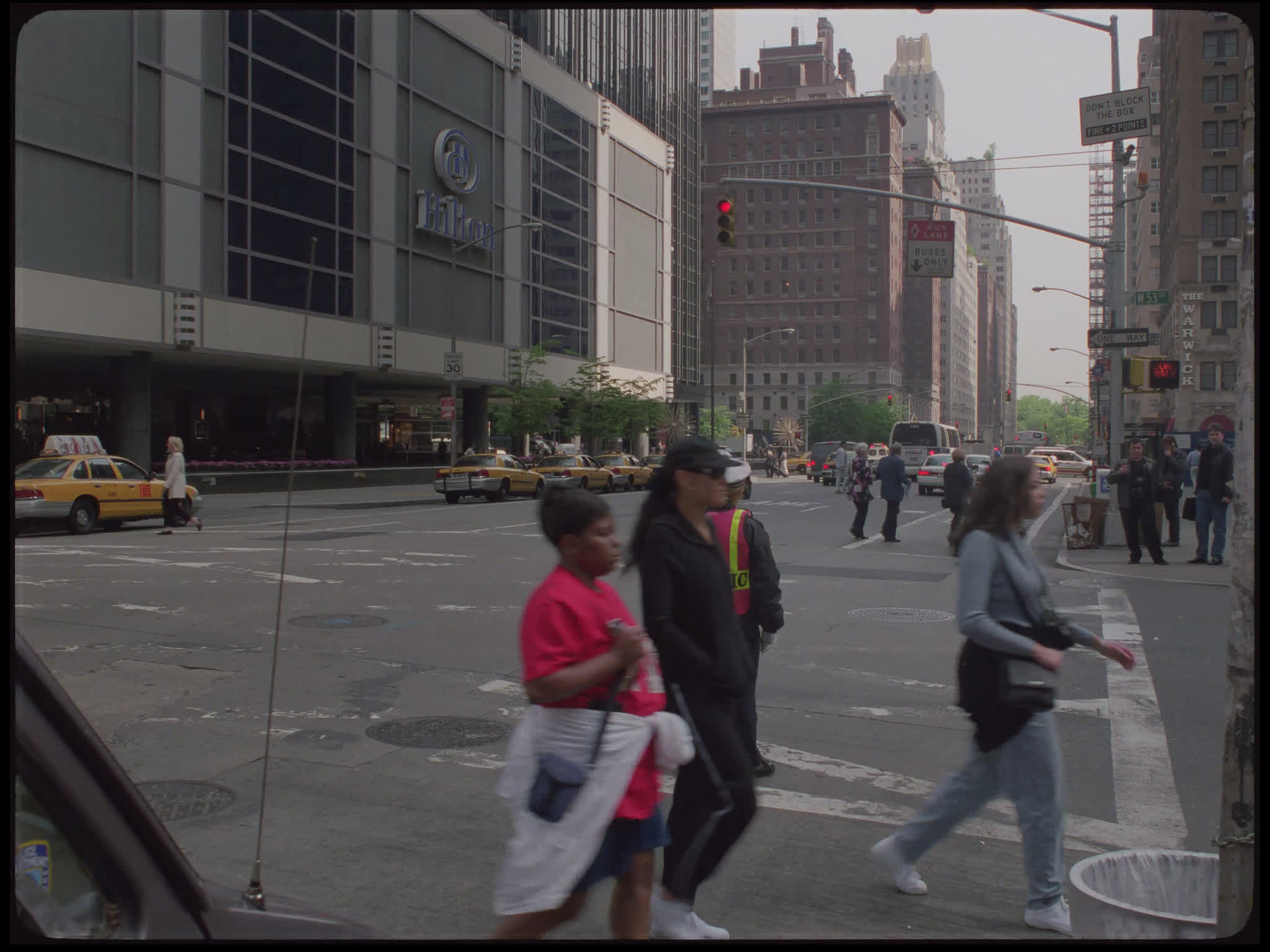 Pedestrians Outside The Hilton Hotel