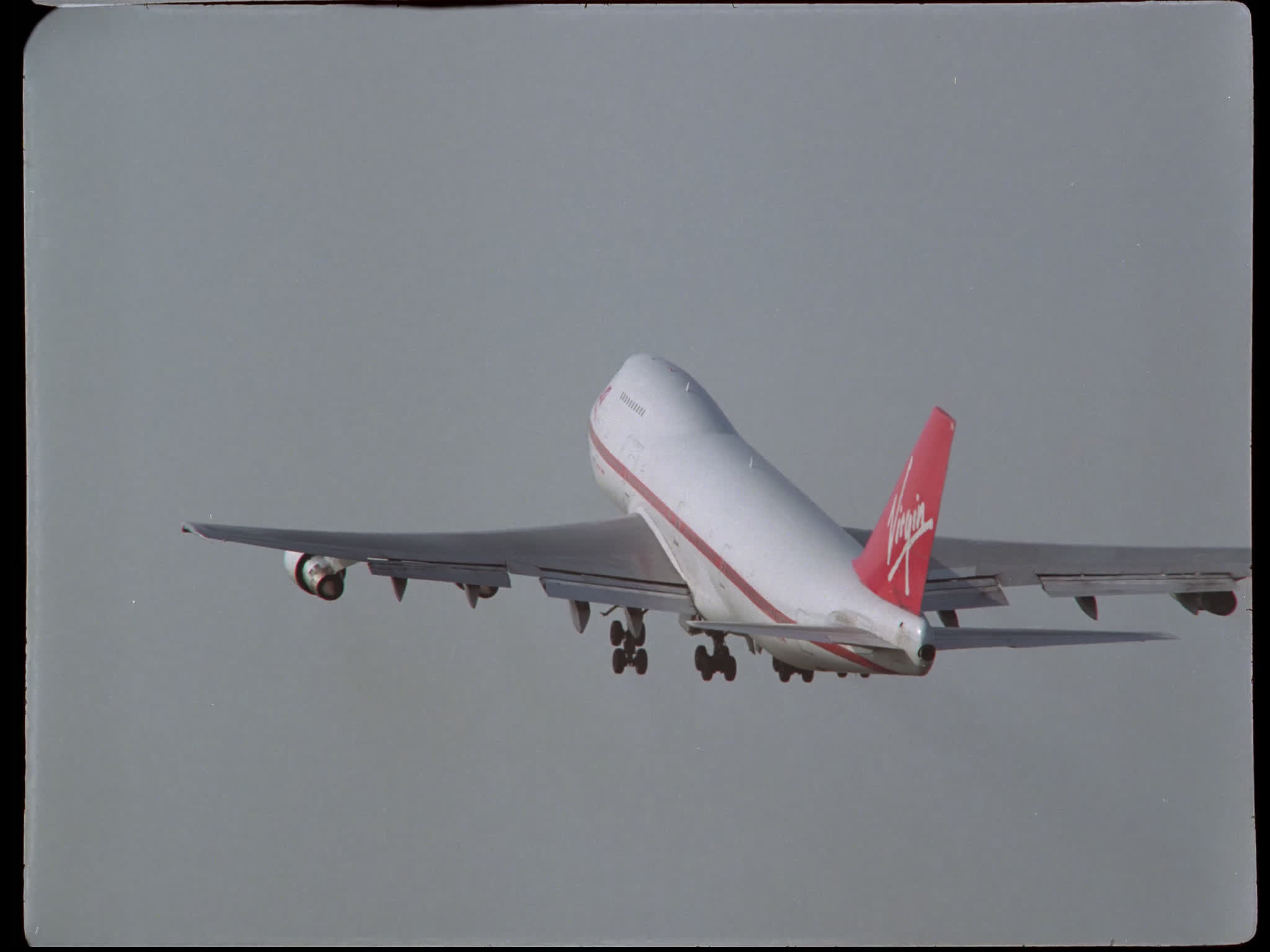 Virgin 747 Taking Off Into Distance