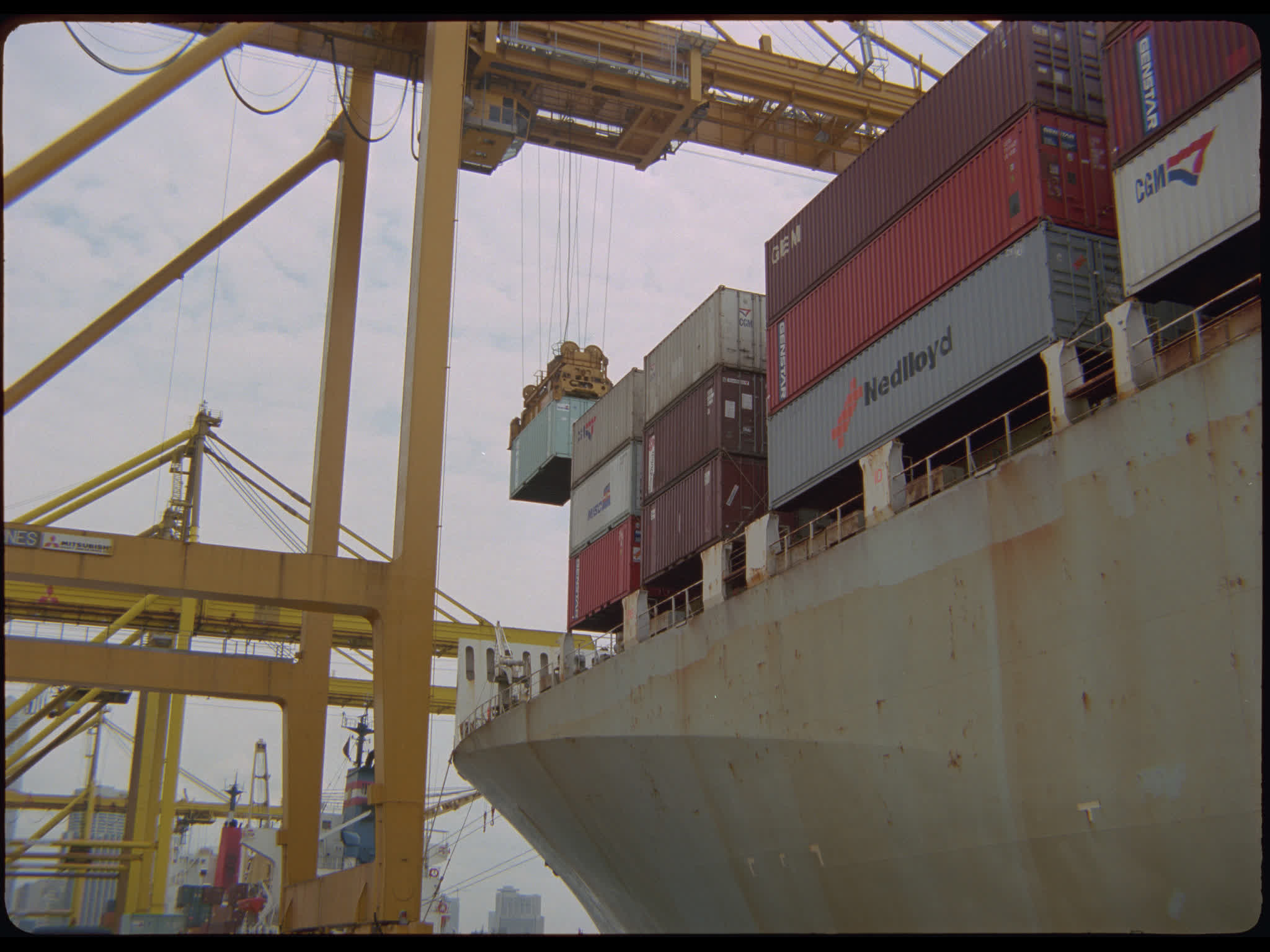 Shipping Container Lowered onto Truck