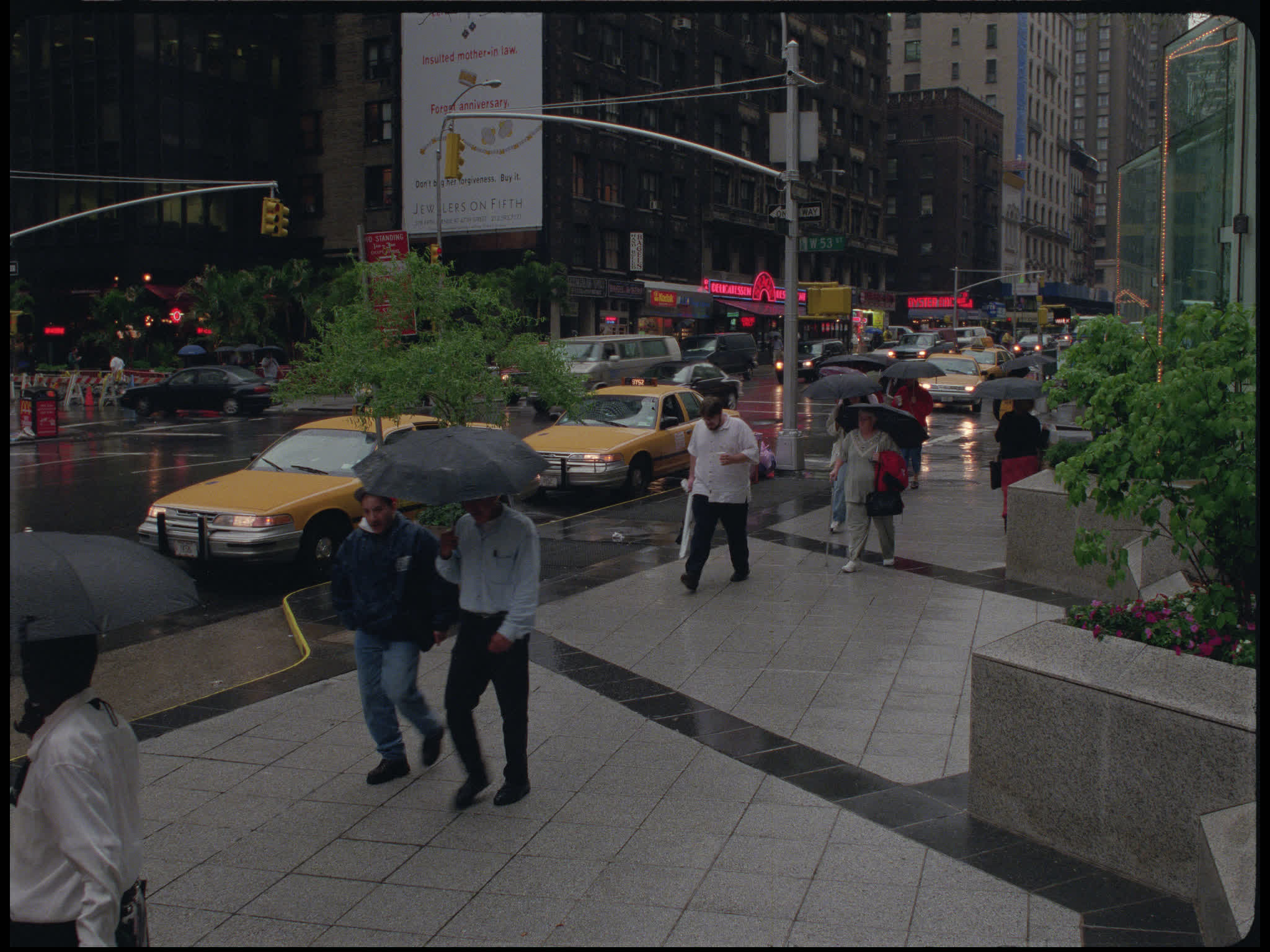 Pedestrians in the Rain