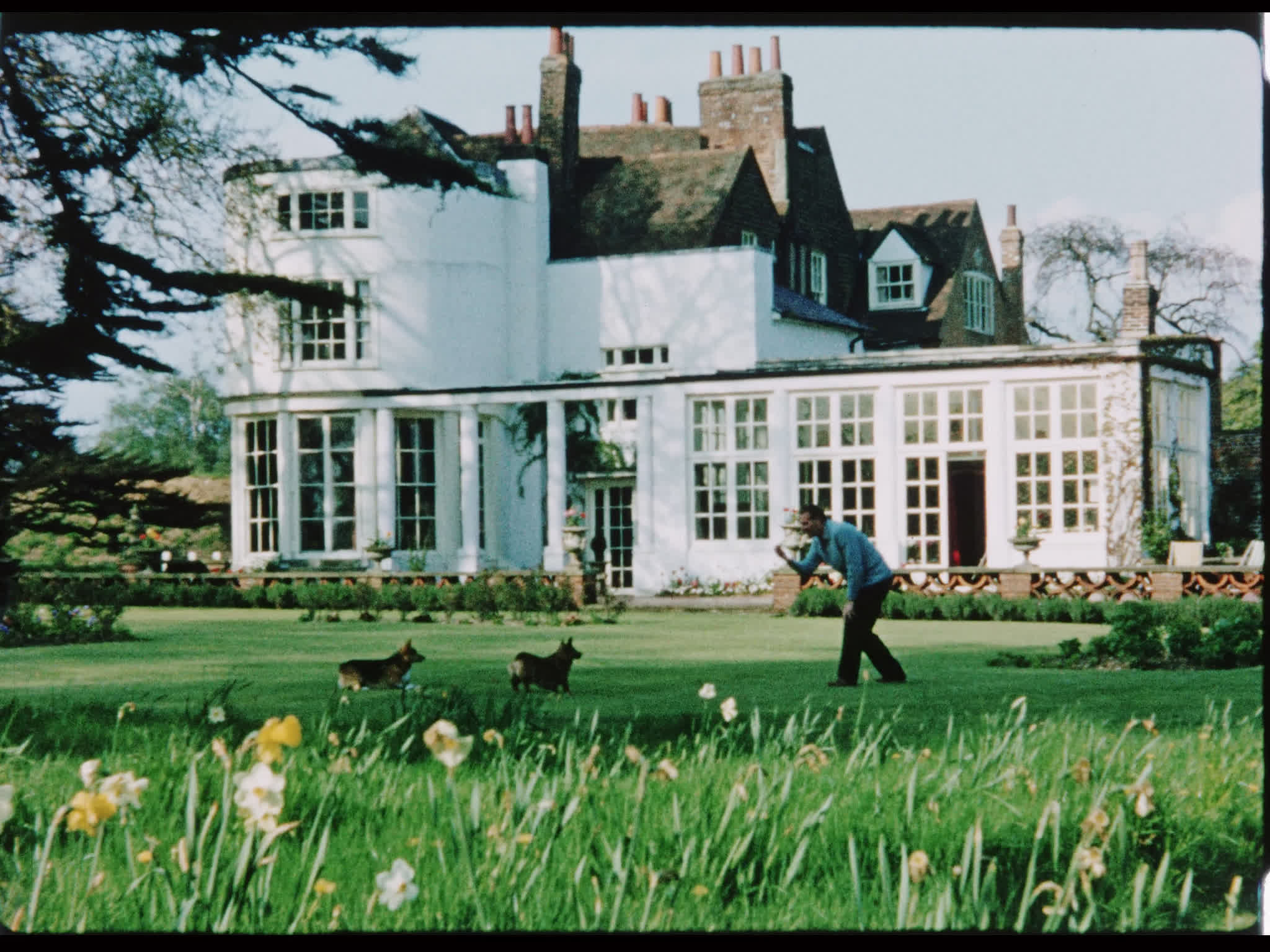 Tony Forwood and Corgis Outside Beel House
