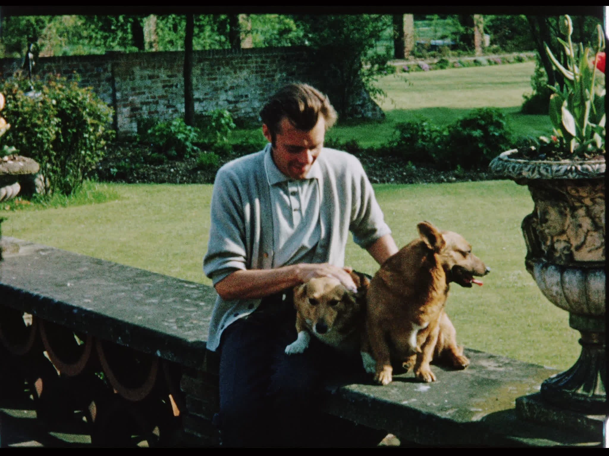 Dirk and Corgis Outside Beel House