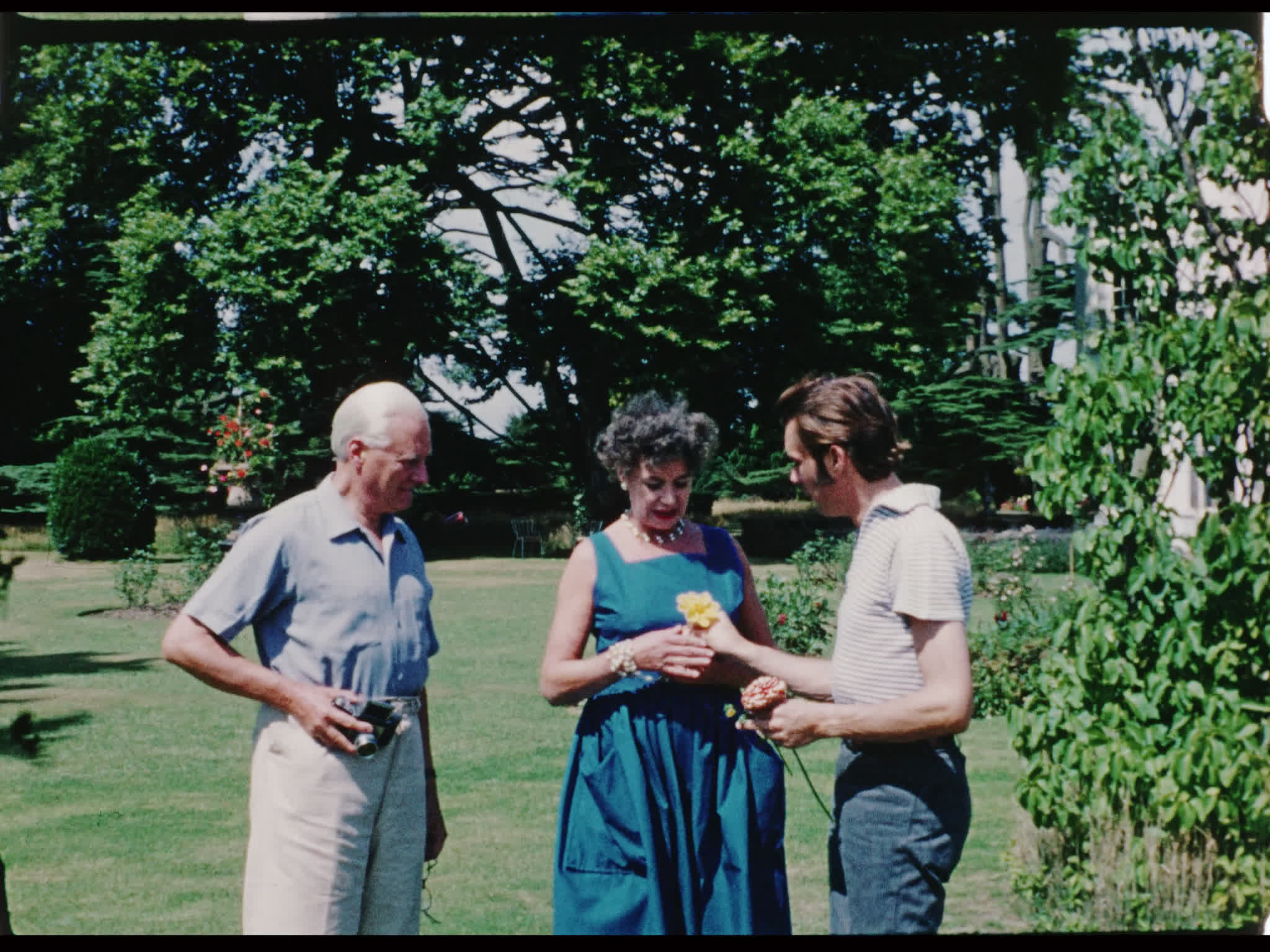 Dirk and His Parents Outside Beel House