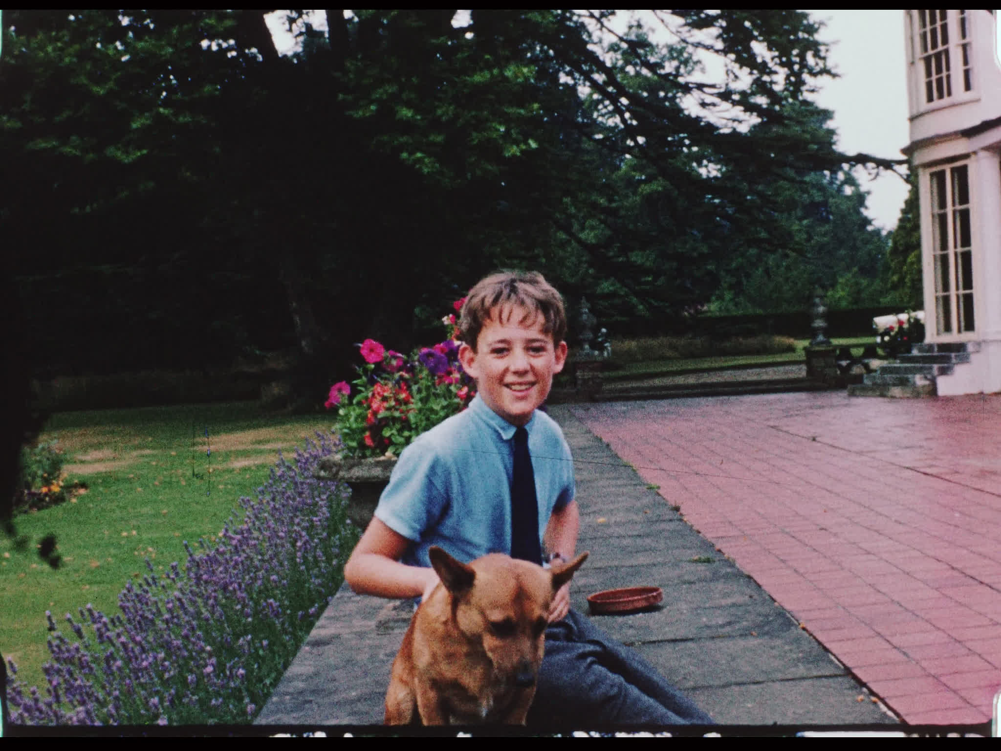 Gareth Forwood and Corgi Outside Beel House