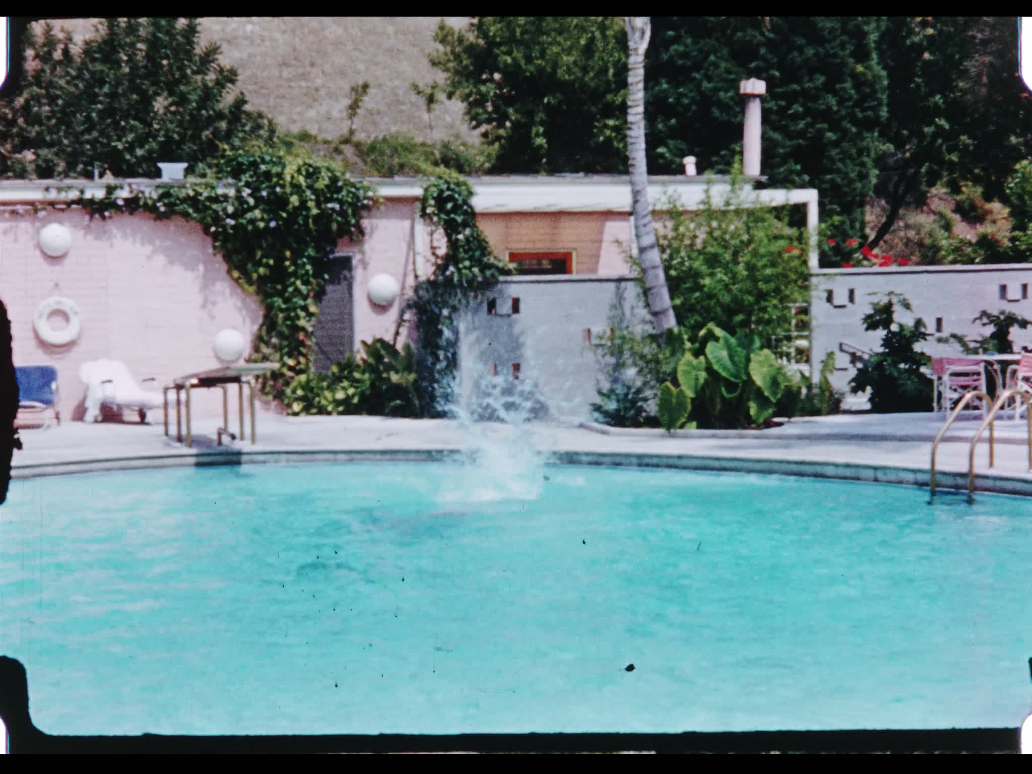 Anthony Forwood Diving into the Pool at Hotel Bel-Air