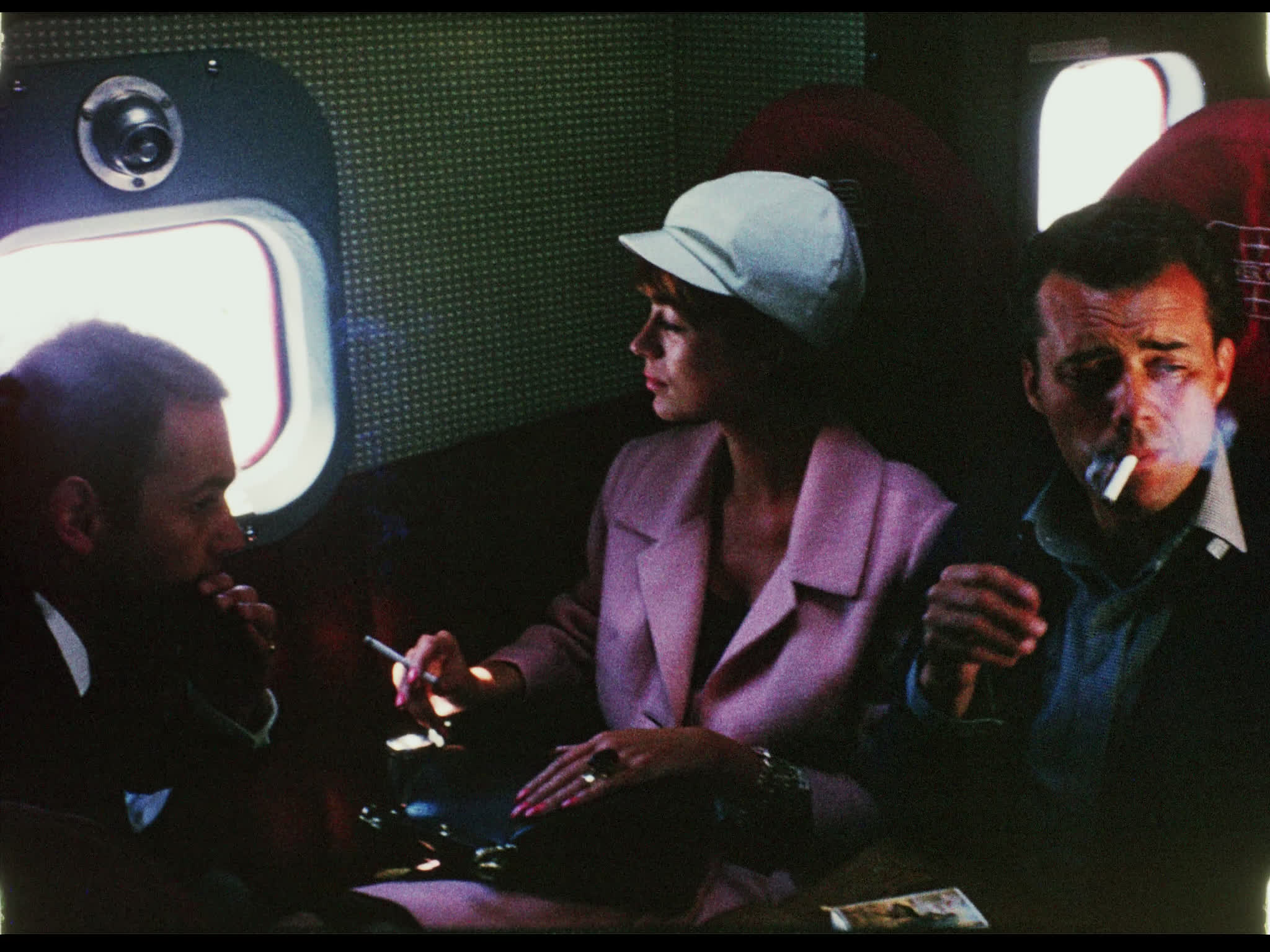 Dirk Bogarde Smoking on a Plane