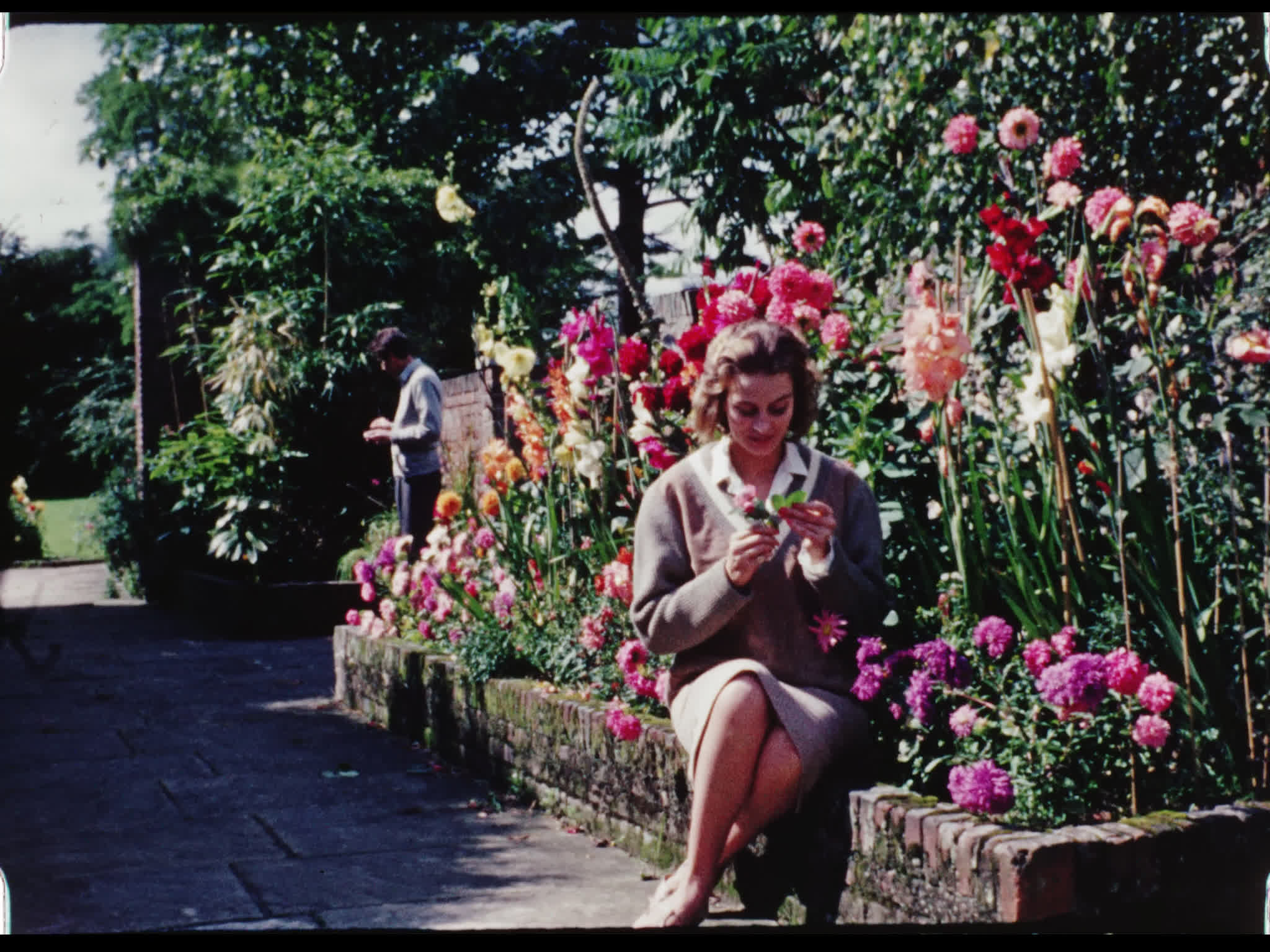 Dirk Bogarde and Capucine Outside Beel House