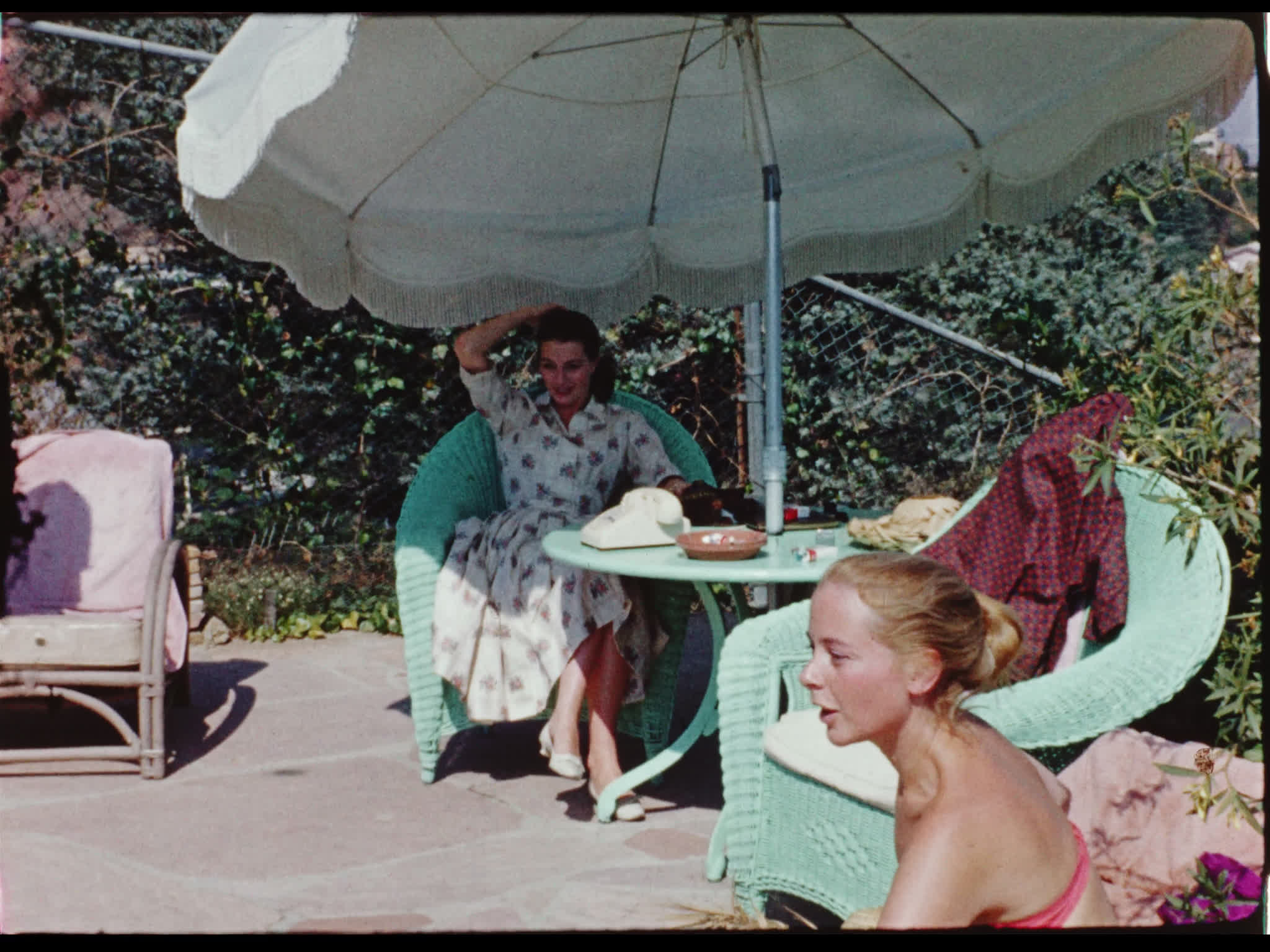 Geneviève Page and Capucine By the Pool