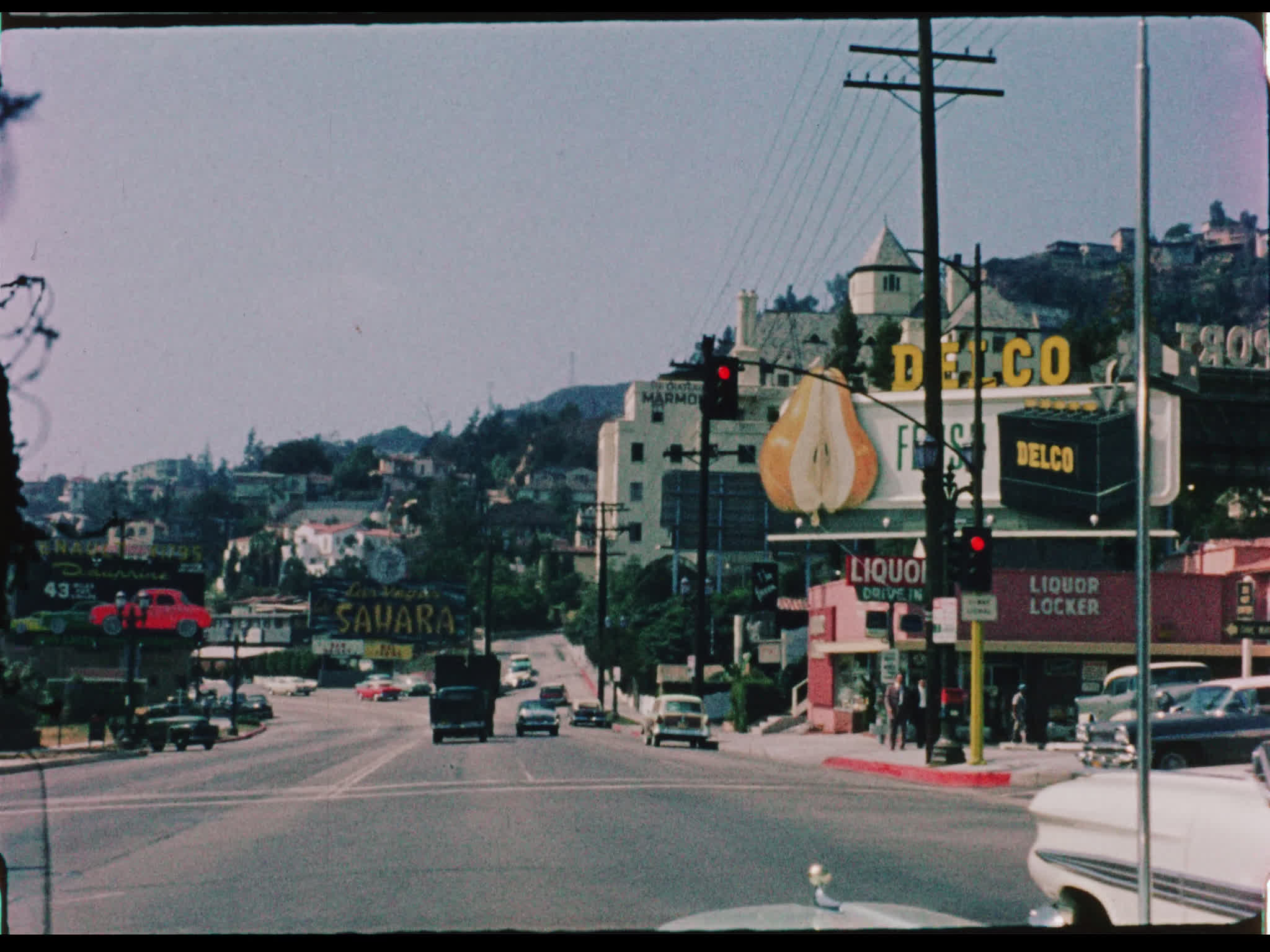 POV Driving Down Sunset Boulevard With Chateau Marmont in the Distance