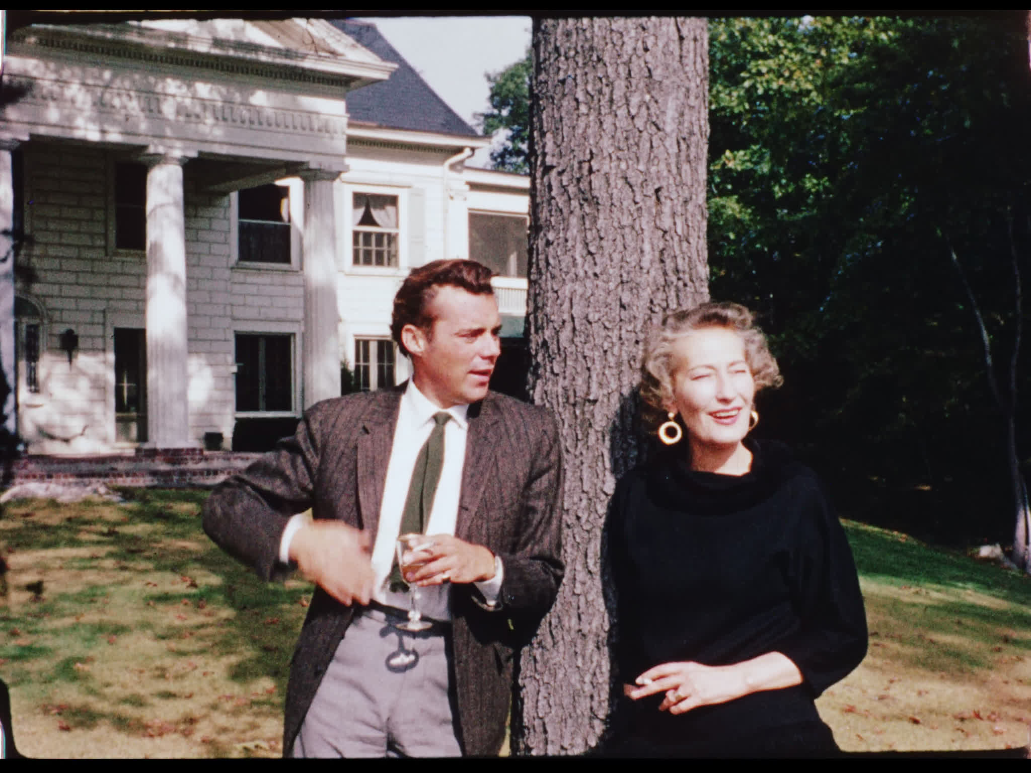 Dirk Bogarde and Kay Young Outside Her Home in Connecticut