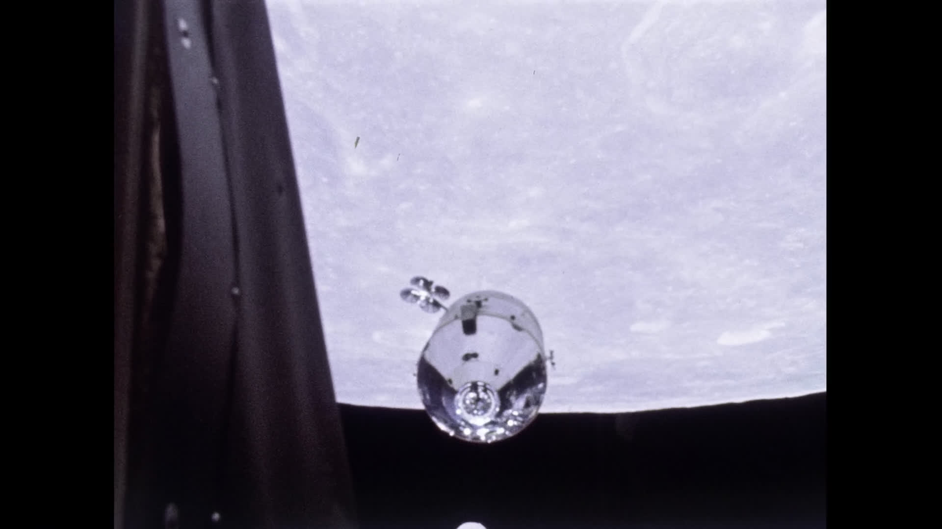 Surface of the Moon and NASA Command Module