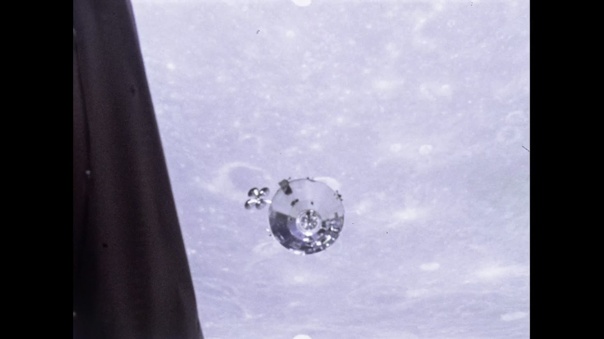 Surface of the Moon and NASA Command Module