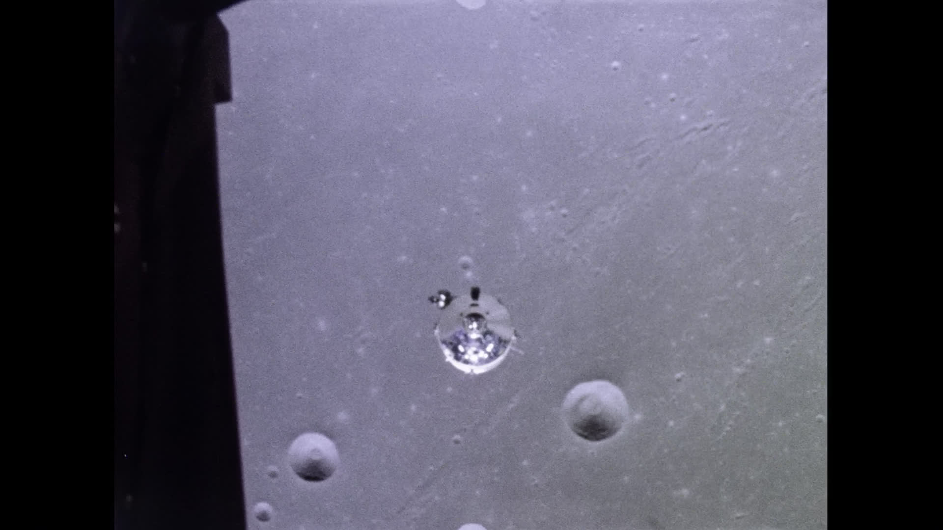 Surface of the Moon and NASA Command Module