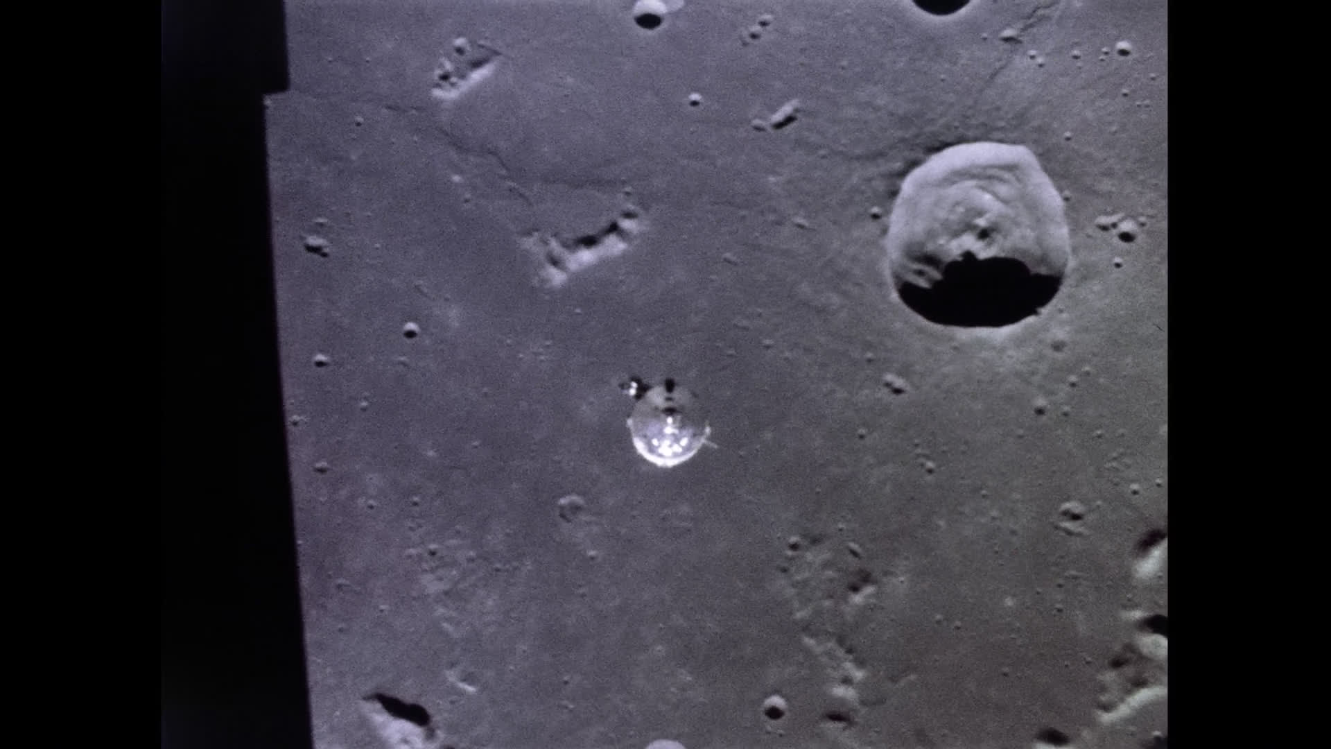 Surface of the Moon and NASA Command Module