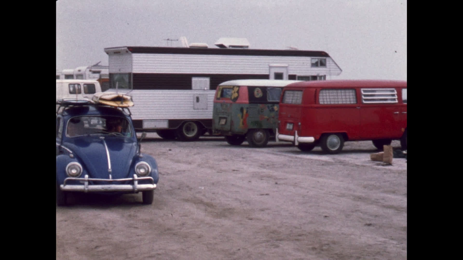 Camper Vans and a VW Beetle at Cocoa Beach