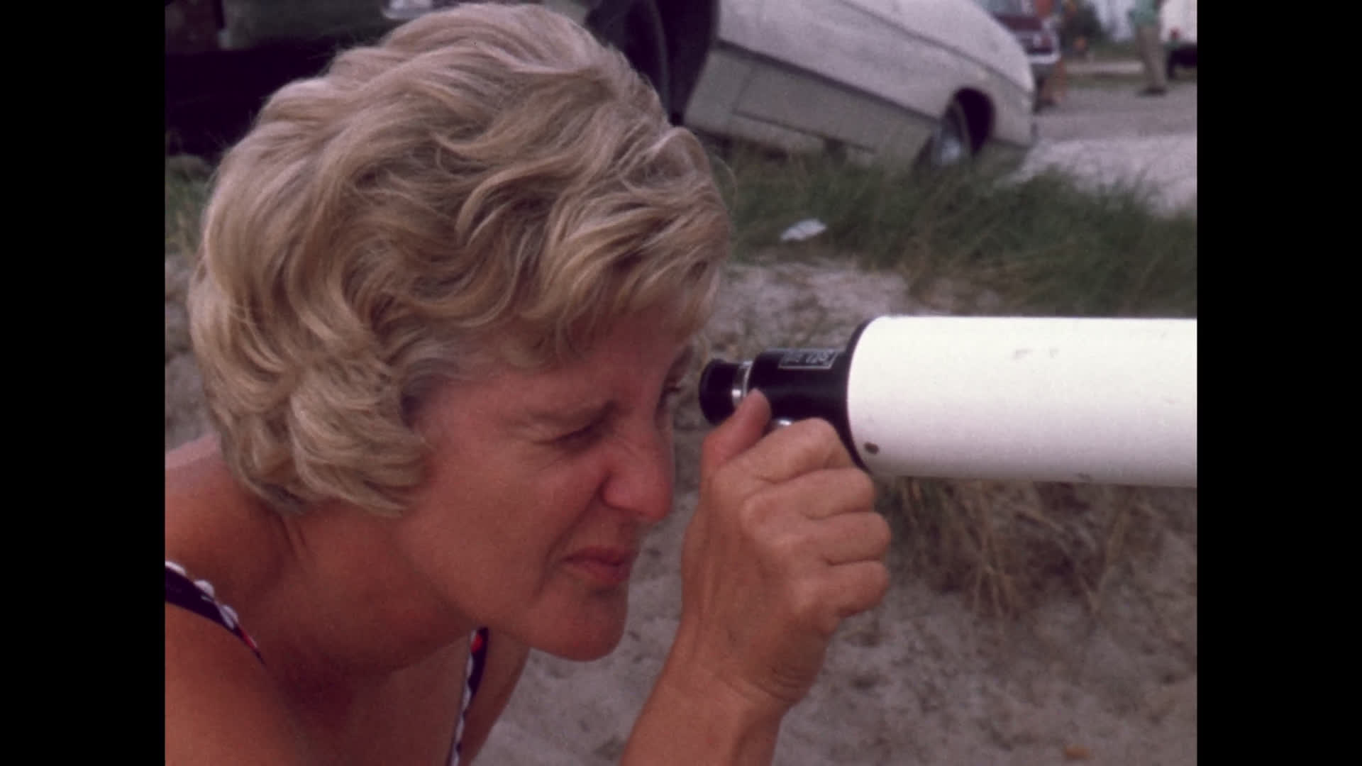 Woman Viewing Telescope at Cocoa Beach
