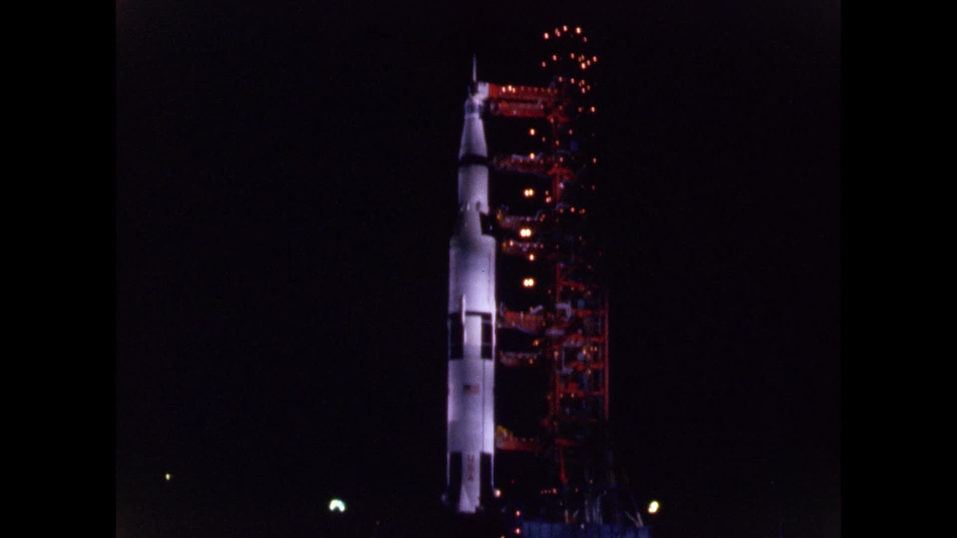 Saturn V Rocket at Night